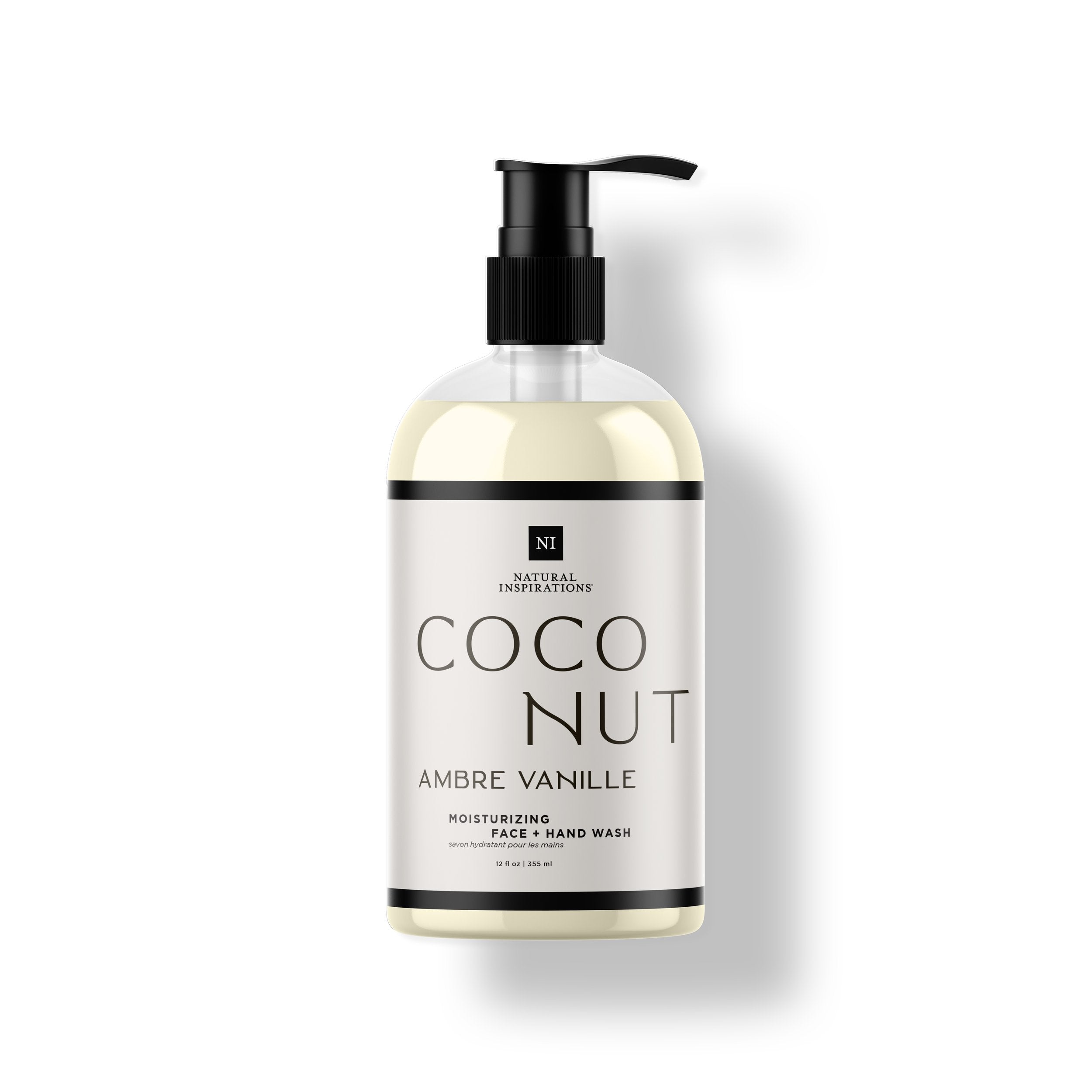 Natural Inspirations Coconut Ambre Vanille Face and Hand Wash bottle on a white background.