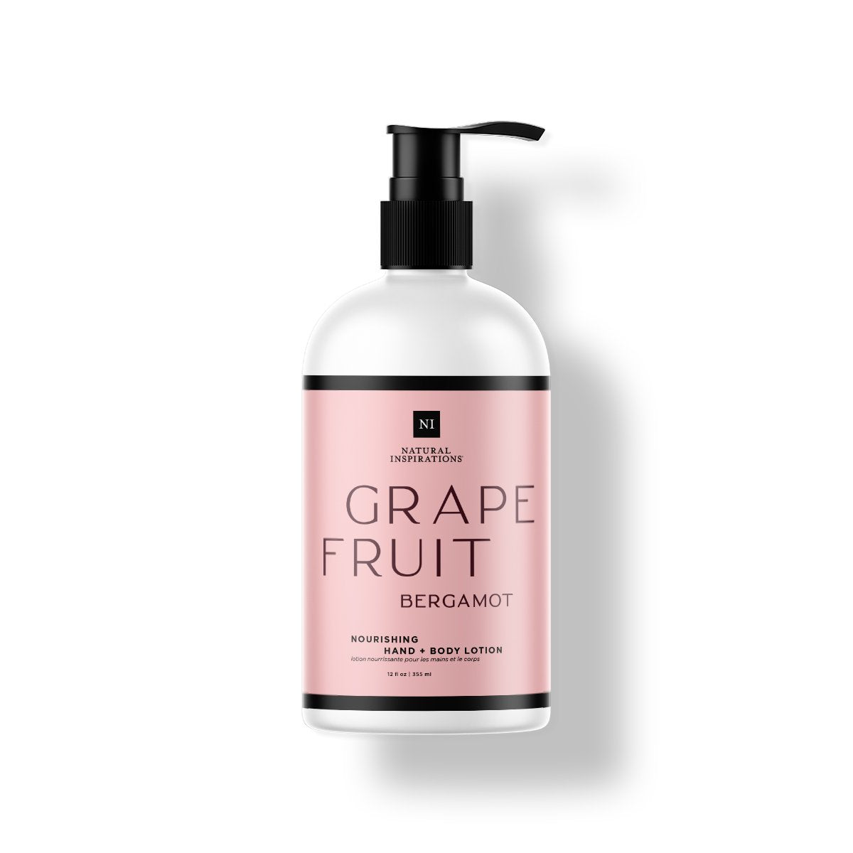 Natural Inspirations Grapefruit Bergamot Hand and Body Lotion bottle on a white background.