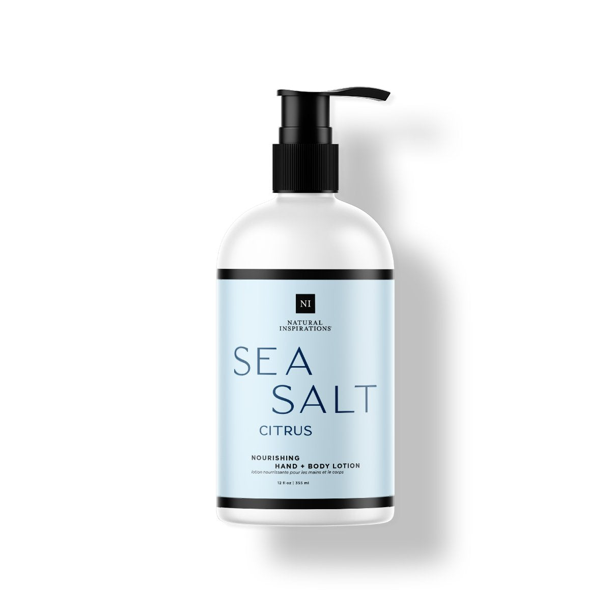 Natural Inspirations Sea Salt Citrus Hand and Body Lotion bottle on a white background.