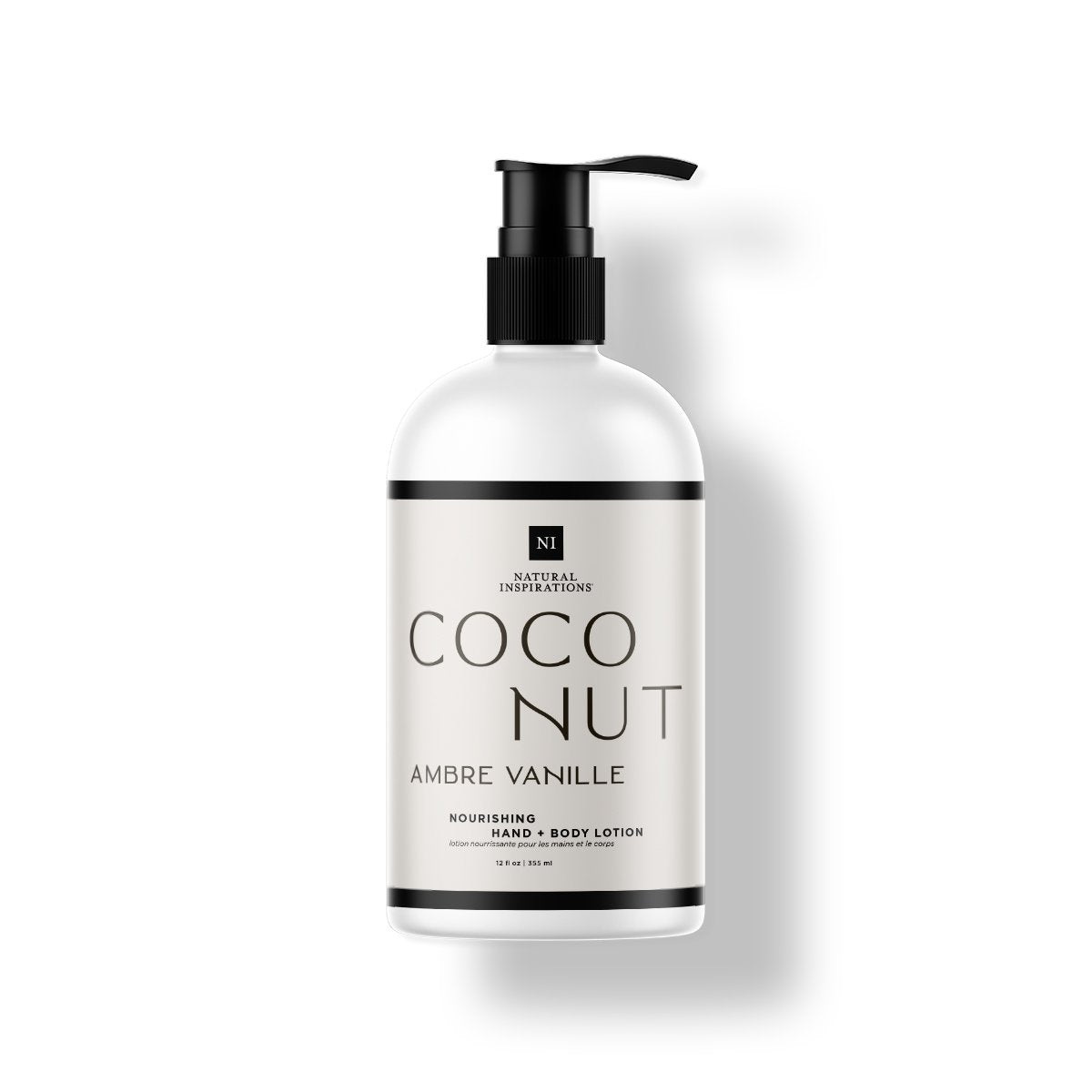 Natural Inspirations Coconut Ambre Vanille Hand and Body Lotion bottle on a white background.