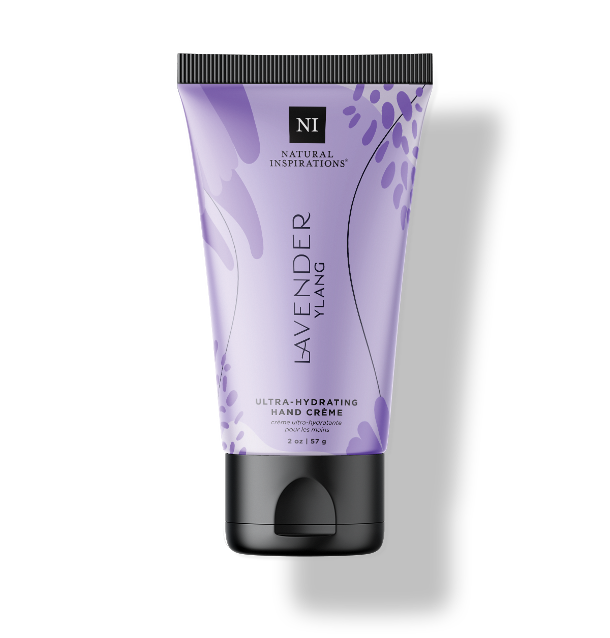 Natural Inspirations Lavender Ylang Mini Hand Cream tube on a white background.