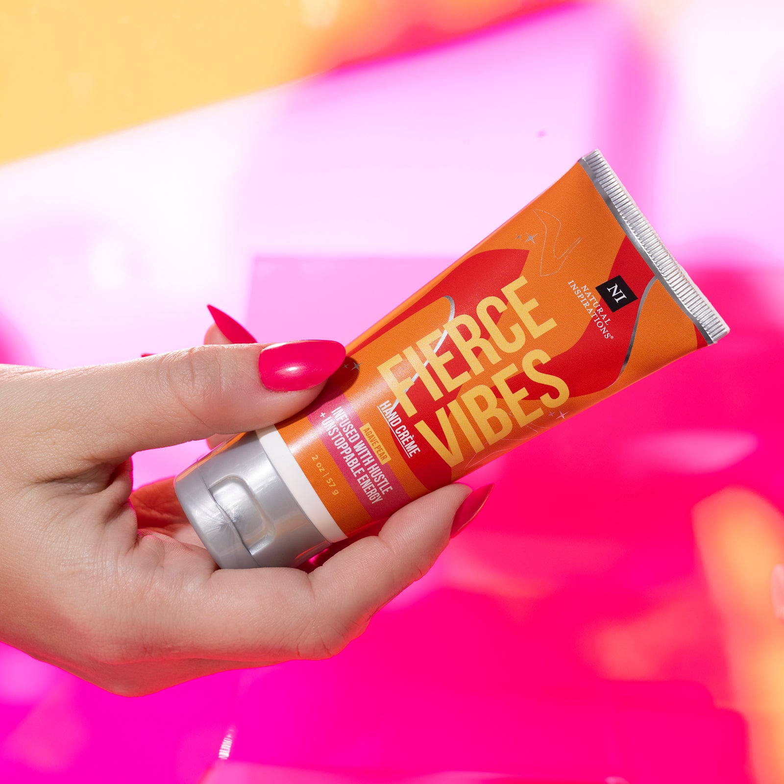 woman holding a fierce vibes mini hand cream