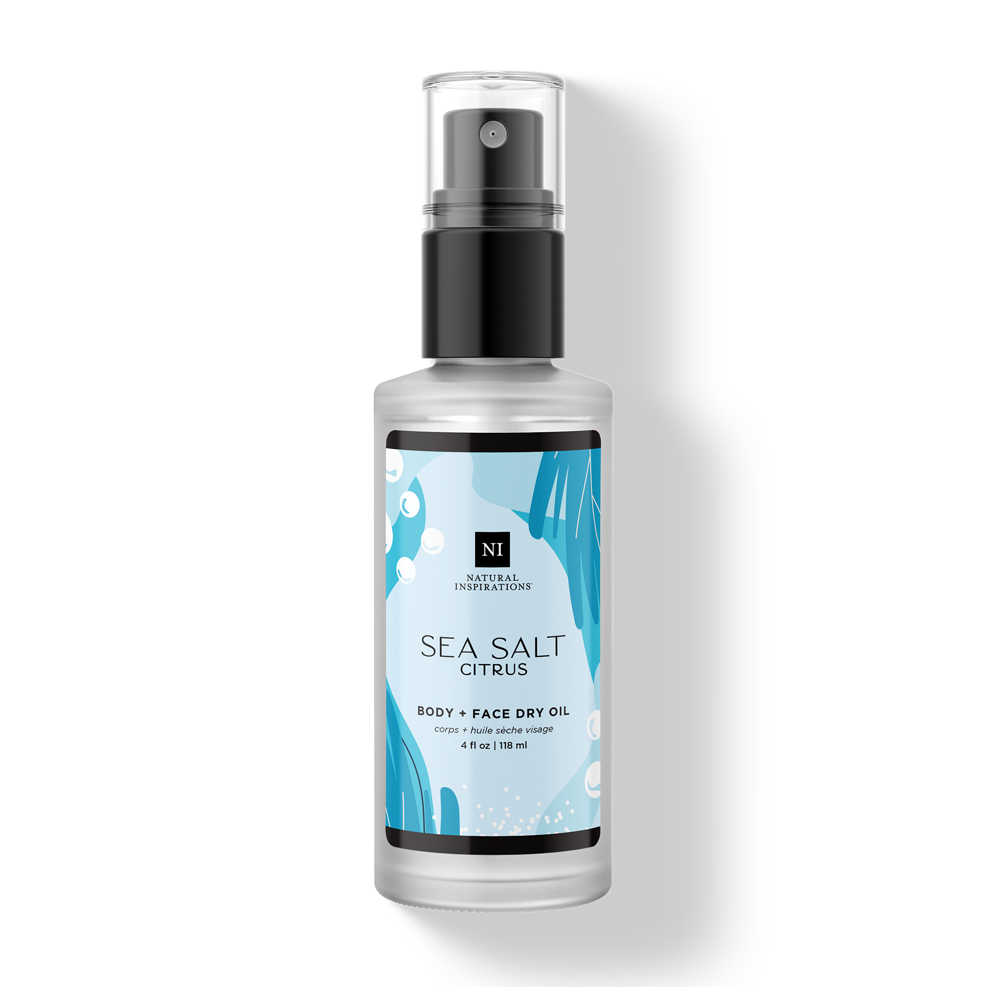 Natural Inspirations Sea Salt Citrus Body and Face Dry Oil frosted glass bottle on a white background.