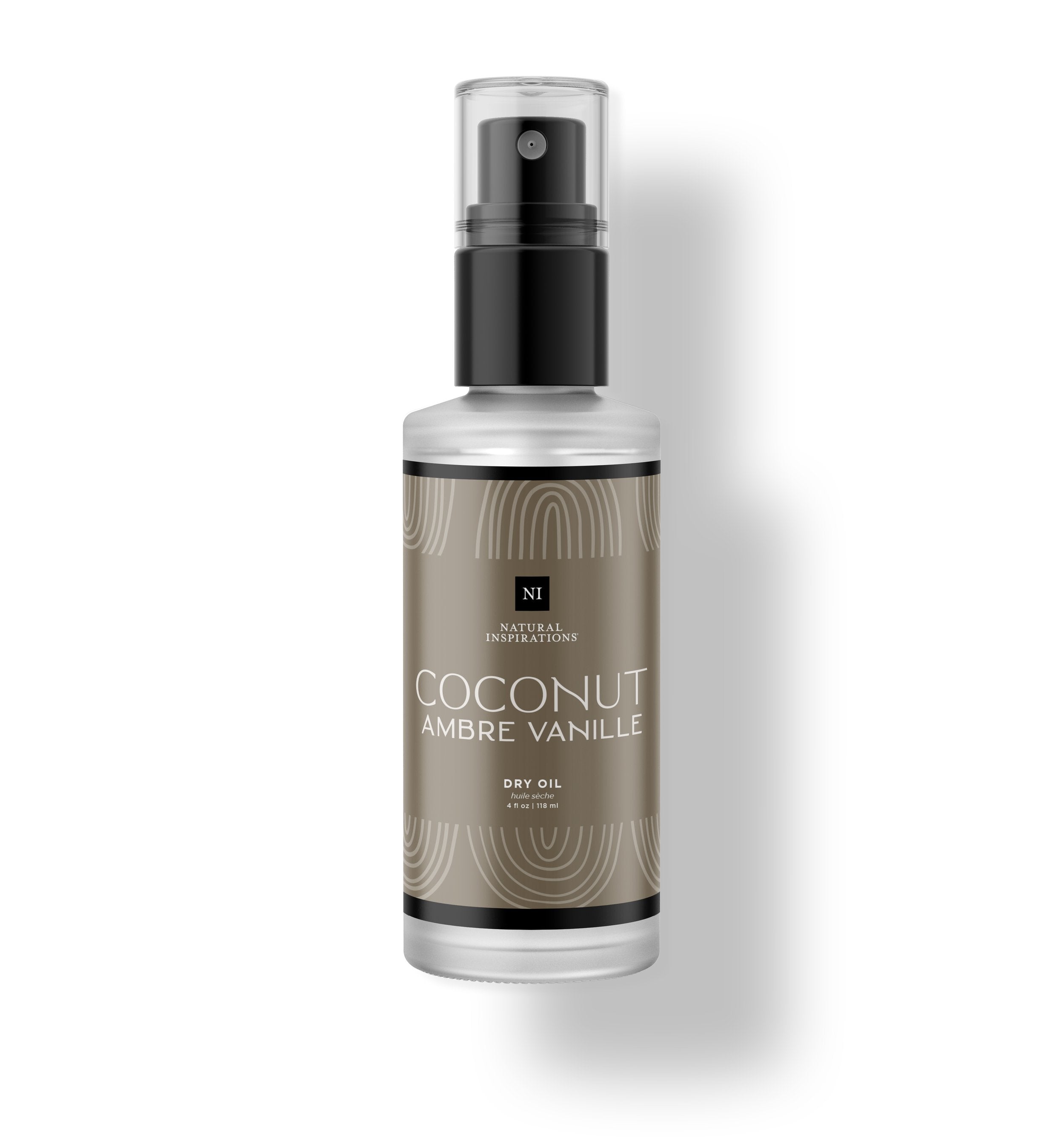 Natural Inspirations Coconut Ambre Vanille Body and Face Dry Oil frosted glass bottle on a white background.