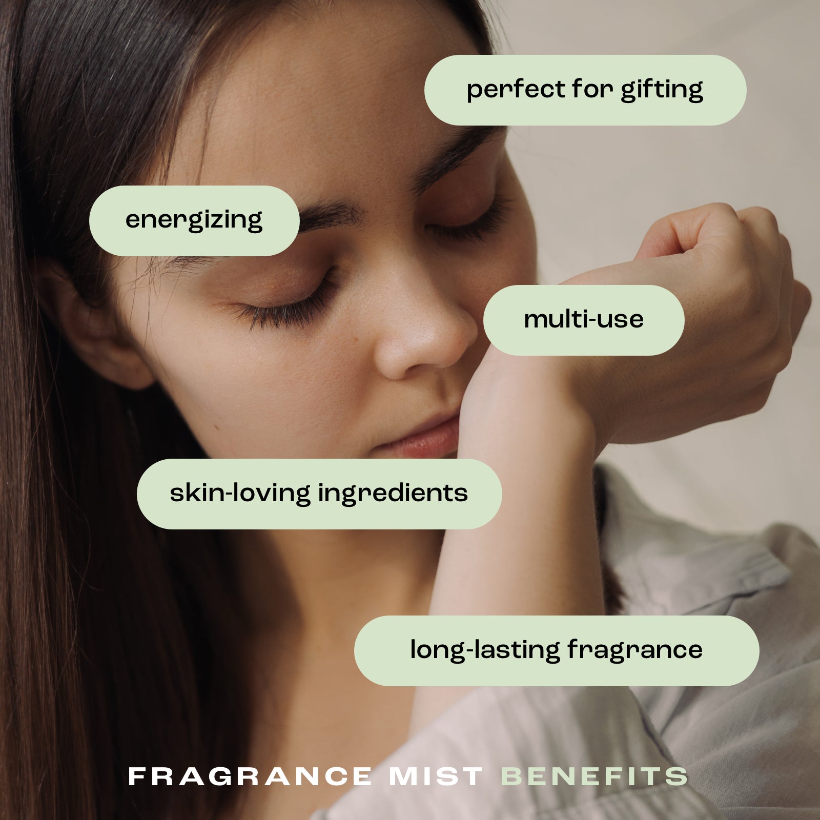 woman smelling her wrist with the listed fragrance mist benefits: perfect for gifting, energizing, multi-use, skin-loving ingredients and long-lasting fragrance