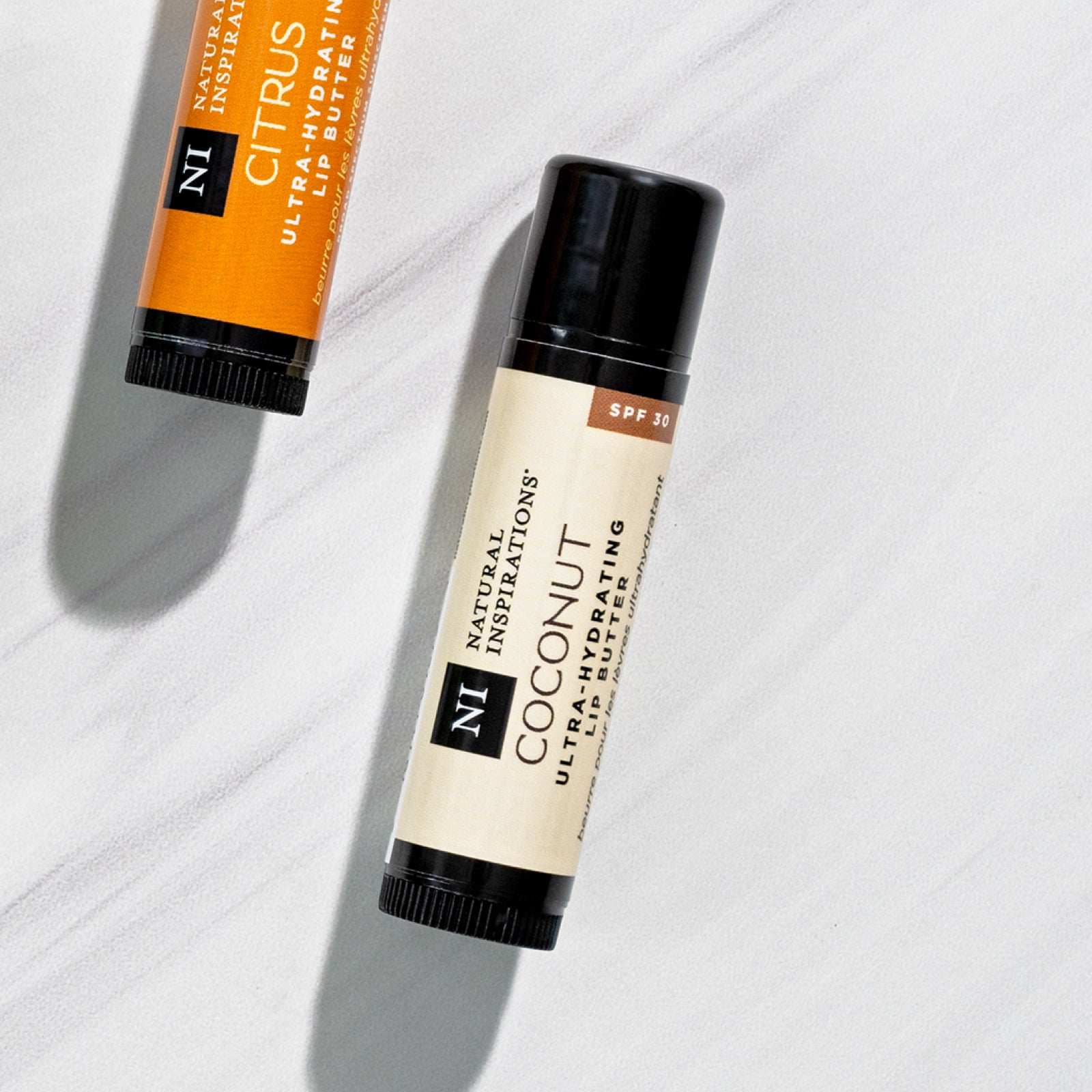 overhead view of lip butter with Coconut flavor in focus