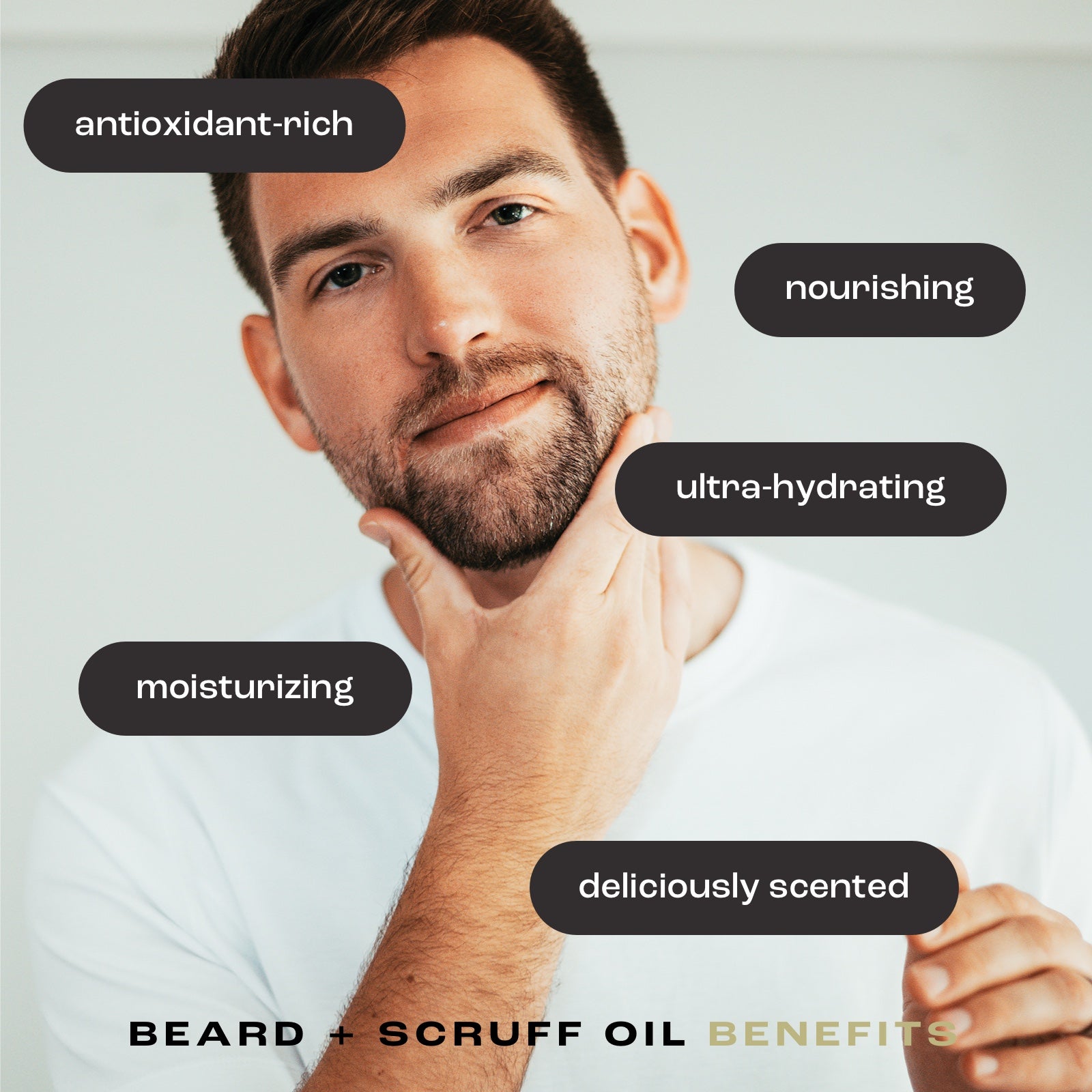 man rubbing his beard with beard oil showing benefits of using the product: antioxidant-rich, nourishing, ultra-hydrating, moisturizing and deliciously scented.