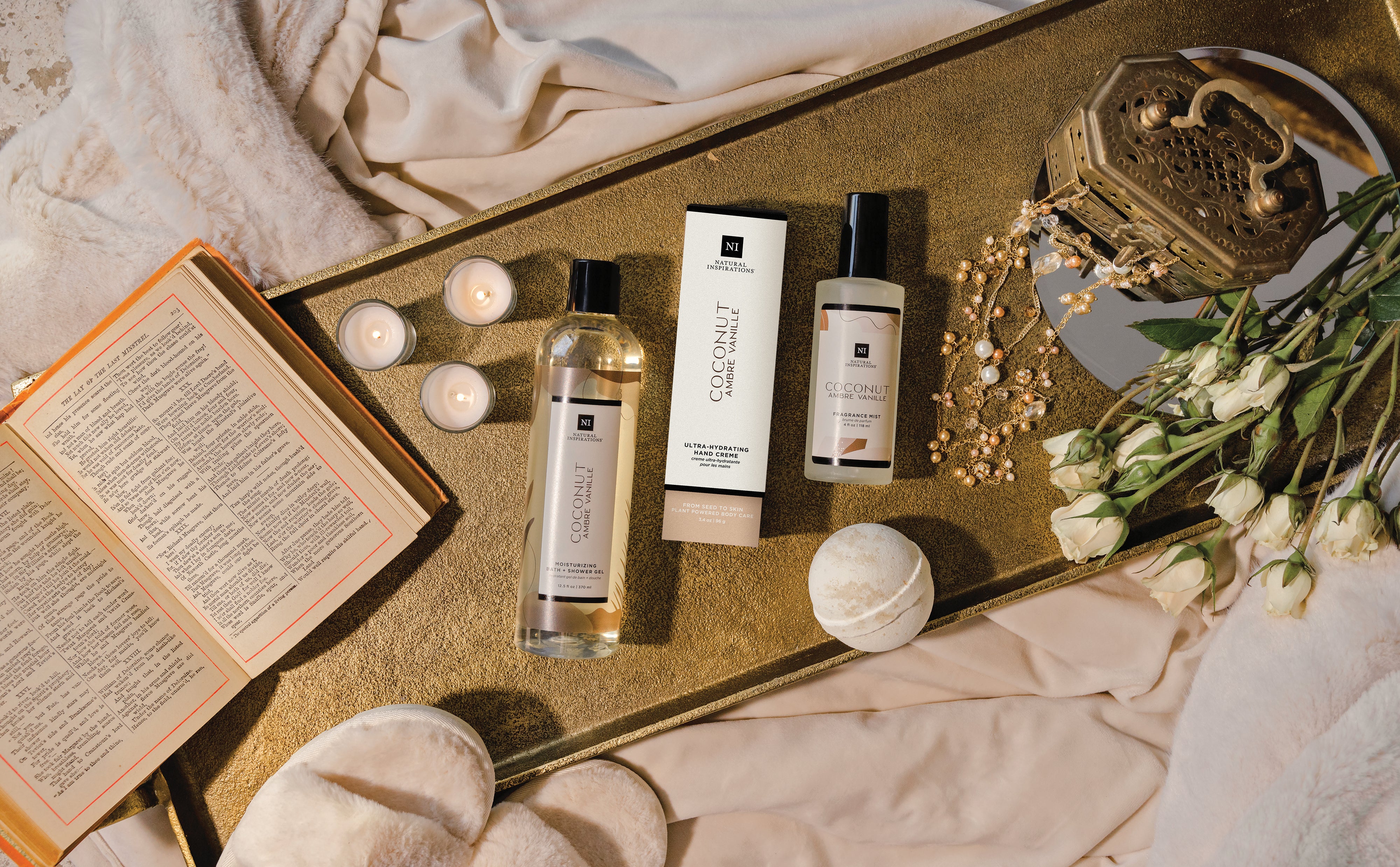 overhead view of coconut ambre vanille products in a bedroom setting