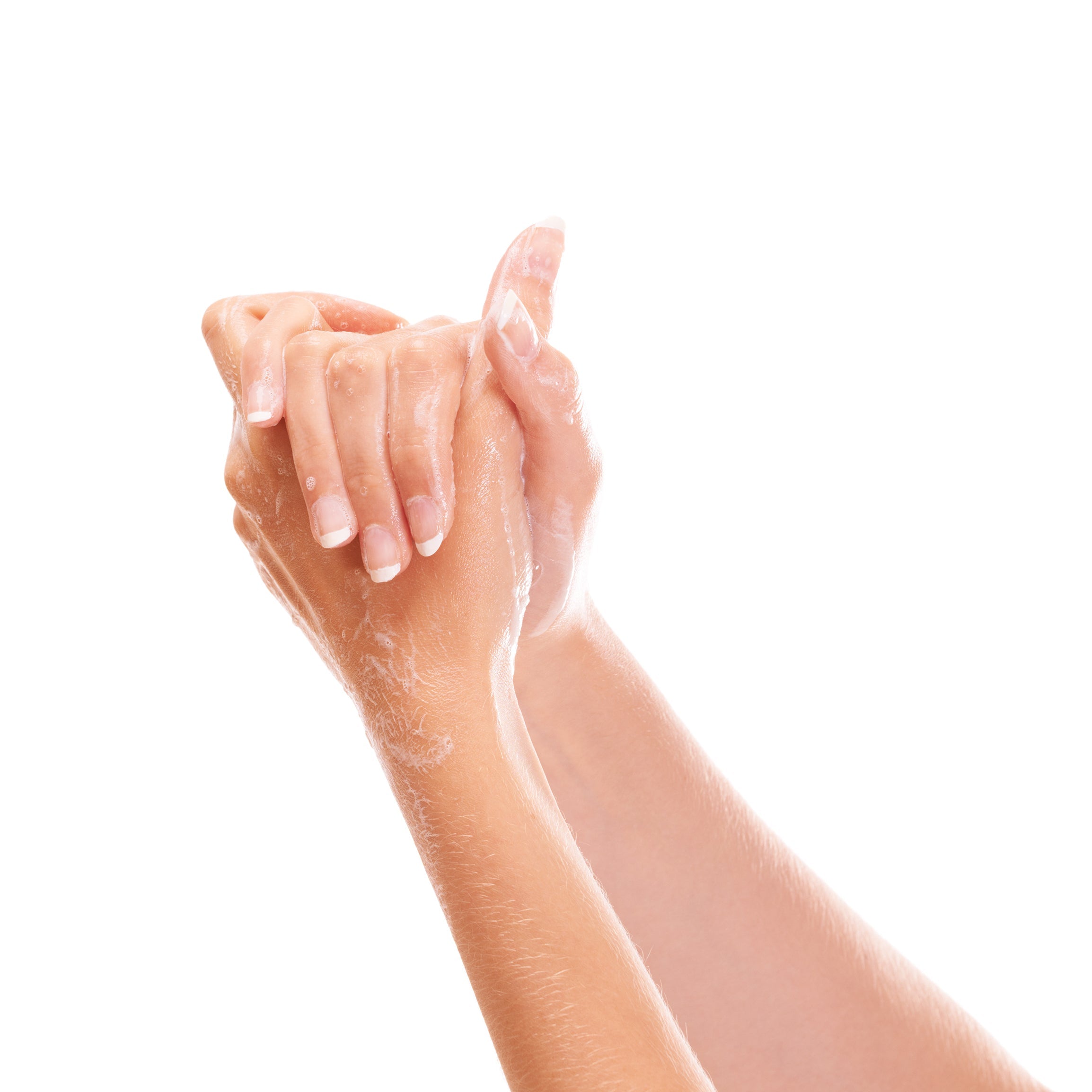 someone washing their hands with handcrafted soap