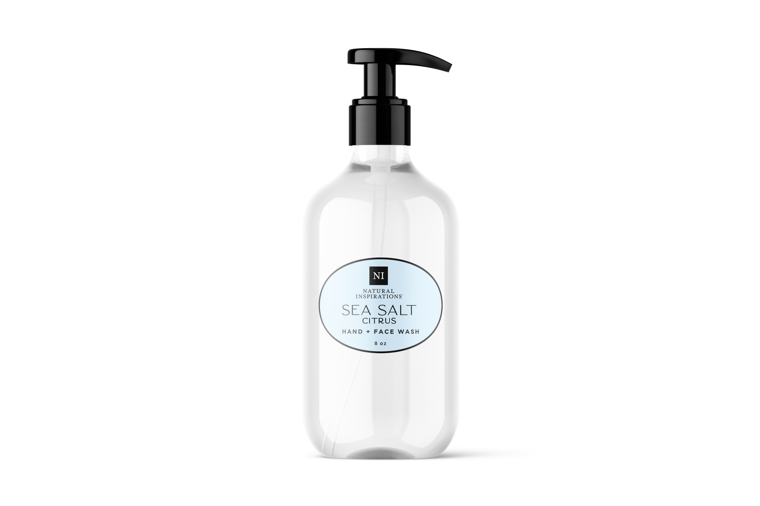 Natural Inspirations Sea Salt Citrus Glass Hand and Body Lotion bottle on a white background.