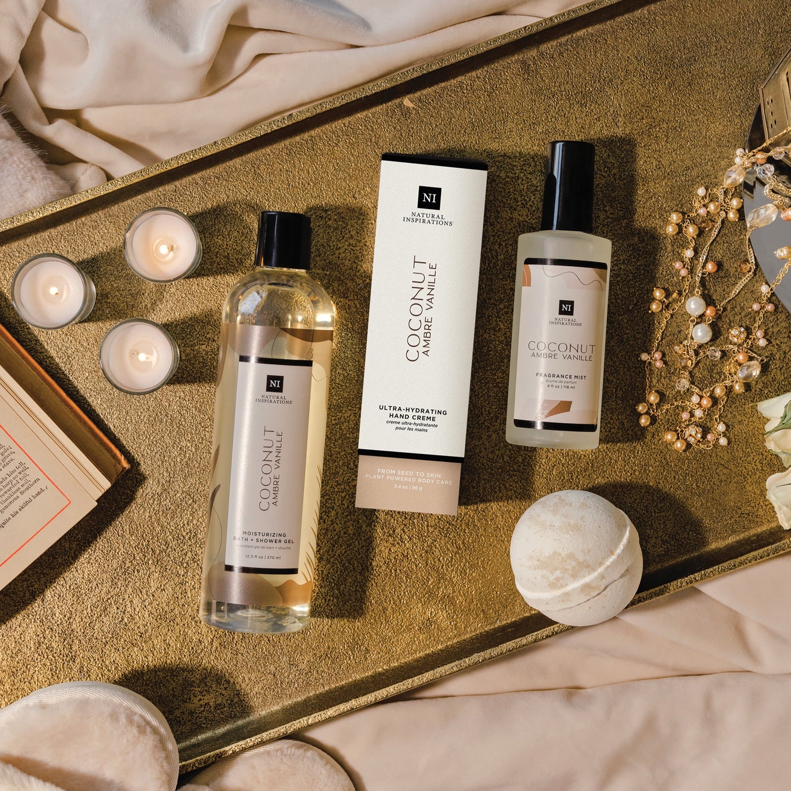 overhead view of coconut ambre vanille products in a bedroom setting