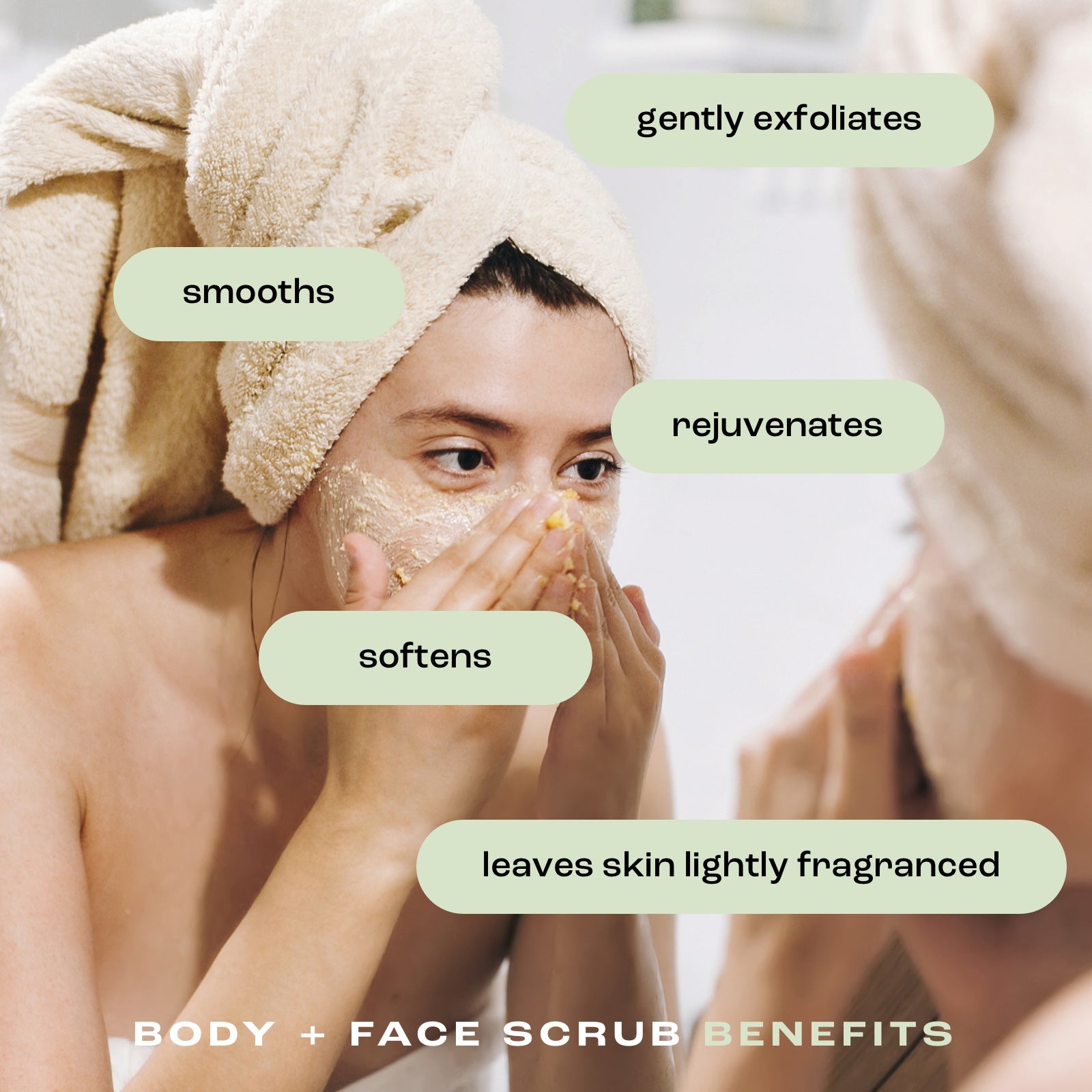 a woman using body and face scrub on her face in a mirror with the benefits listed: gently exfoliates, smooths, rejuvenates, softens, leaves skin lightly fragranced