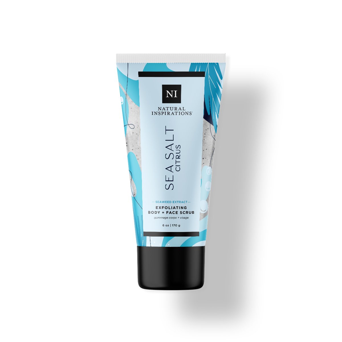 Natural Inspirations Sea Salt Citrus Face and Body Scrub tube on a white background.
