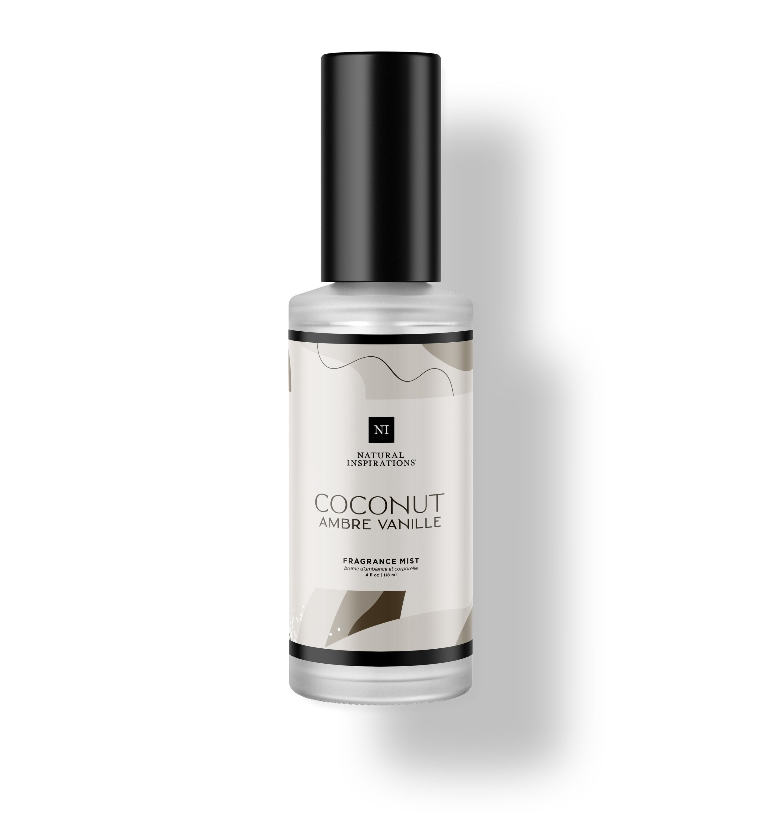 Natural Inspirations Coconut Ambre Vanille Fragrance Mist frosted glass bottle on a white background.