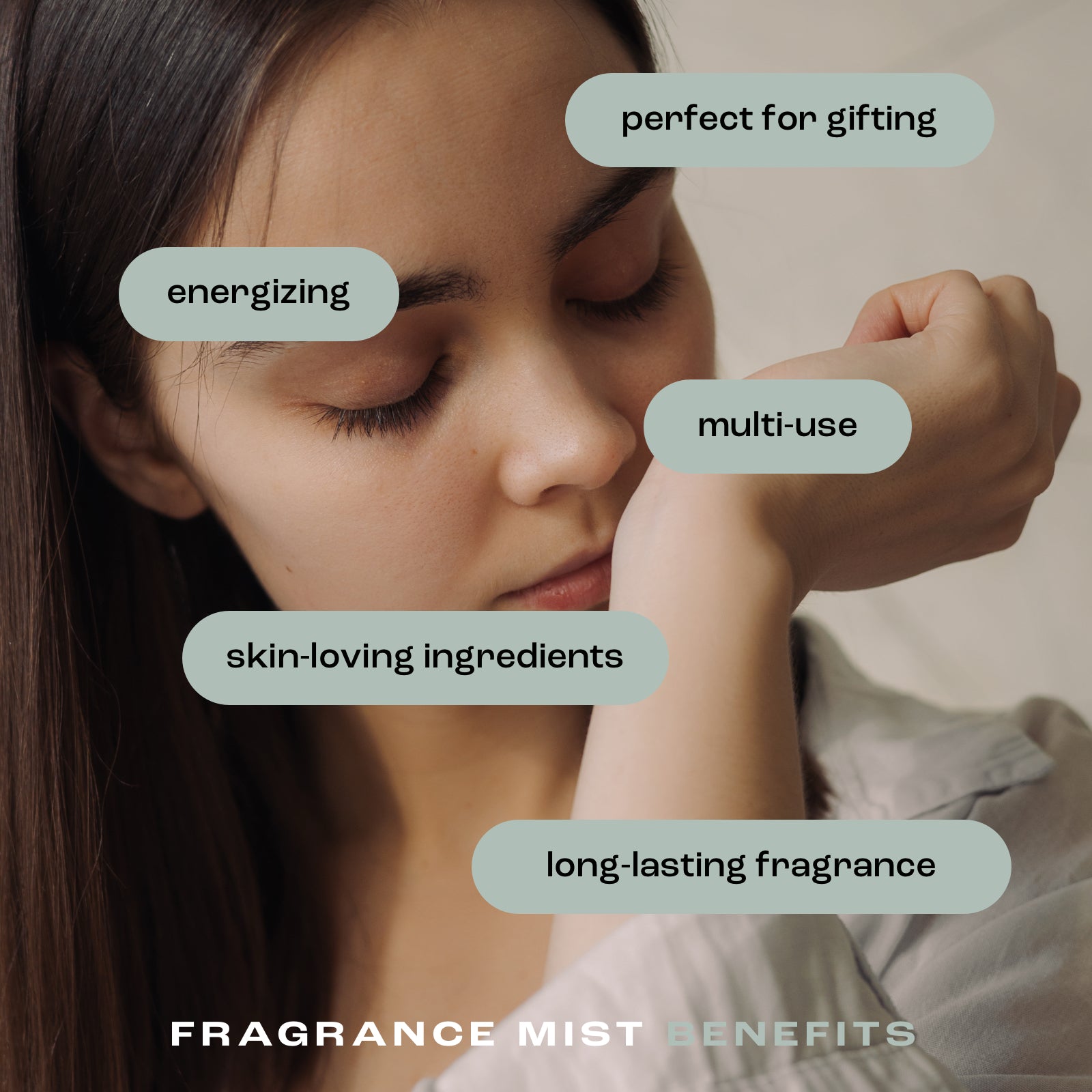 woman smelling her wrist with the listed fragrance mist benefits: perfect for gifting, energizing, multi-use, skin-loving ingredients and long-lasting fragrance