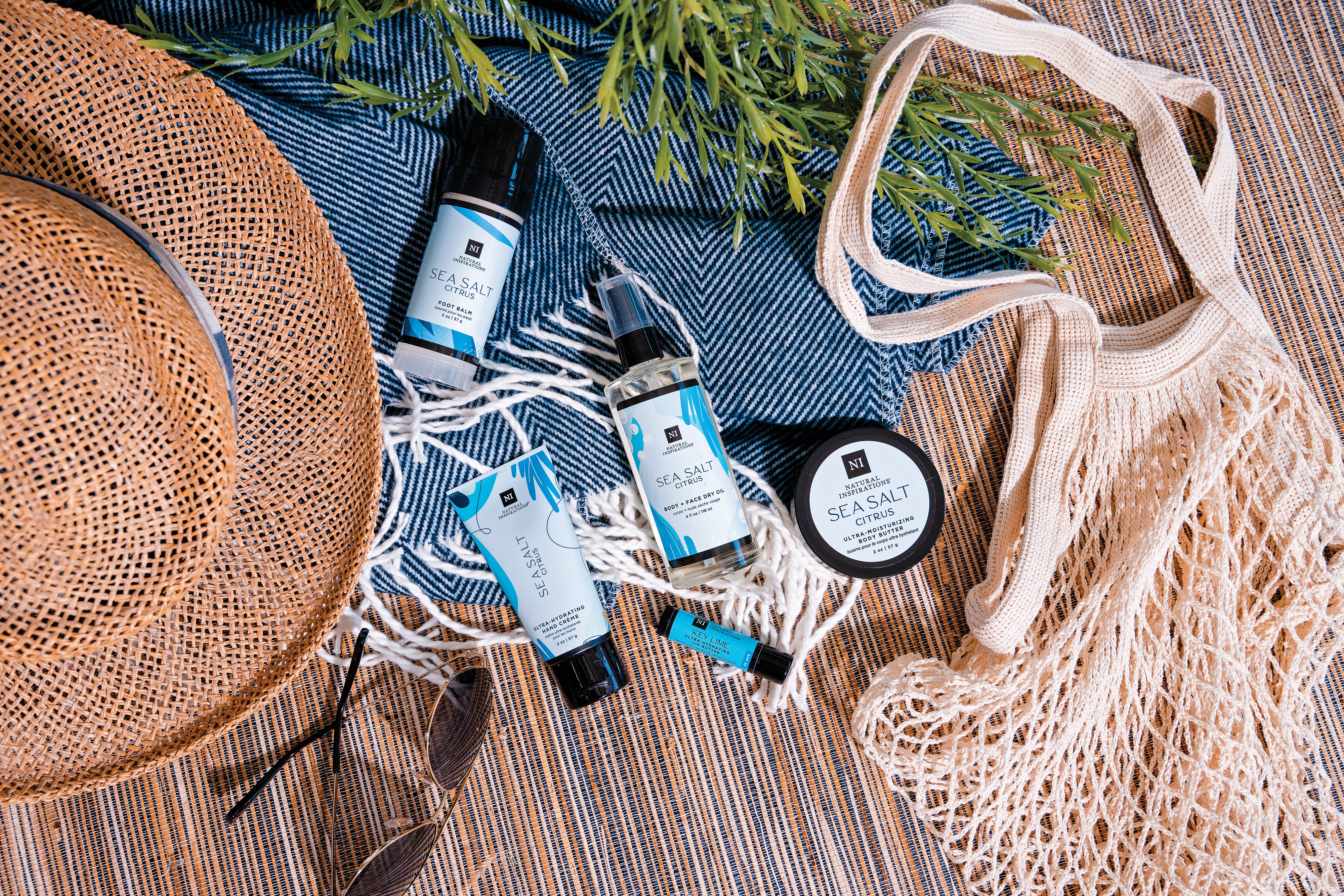 overhead view of sea salt citrus products in a beach setting