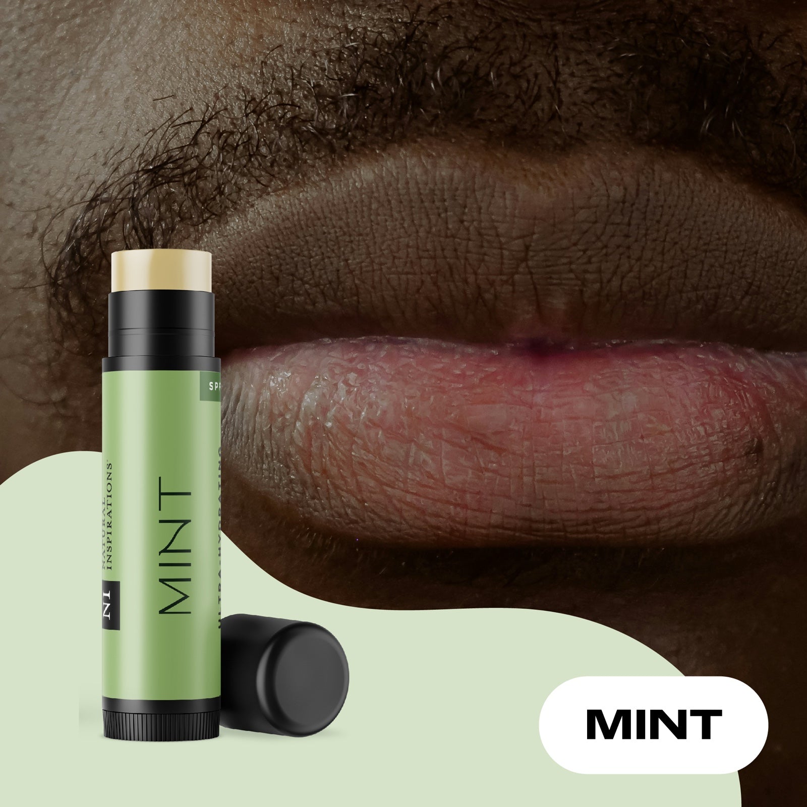close up image of man's lips with mint lip butter showing