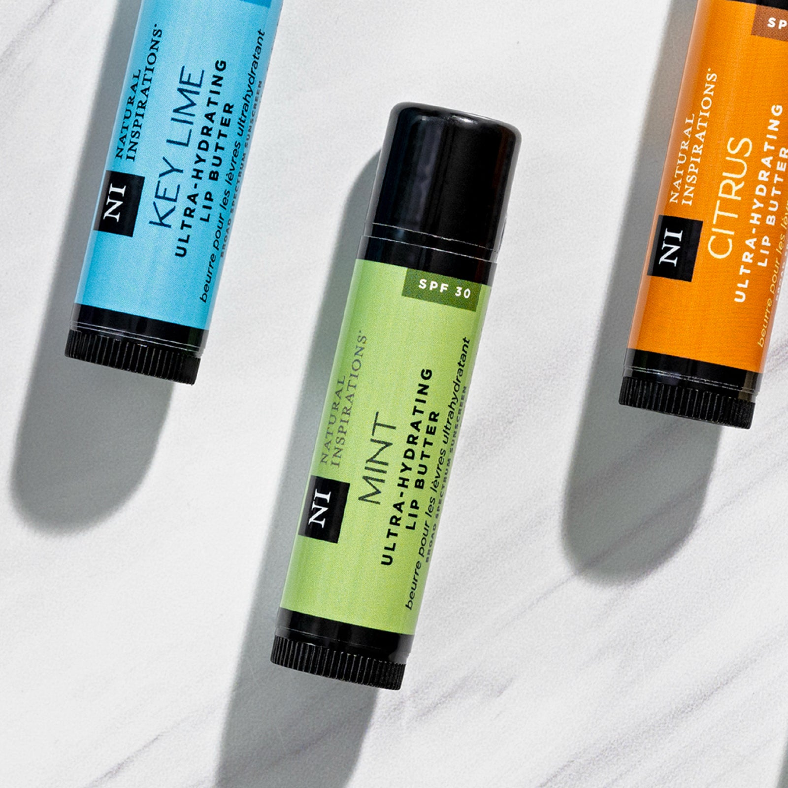 overhead view of lip butter with Mint flavor in focus