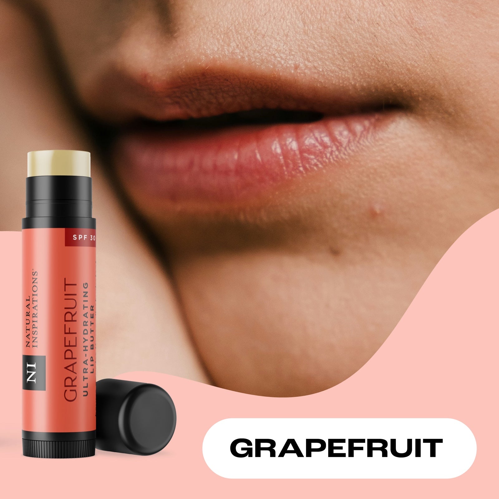 close up of woman's lips with grapefruit spf 30 lip butter