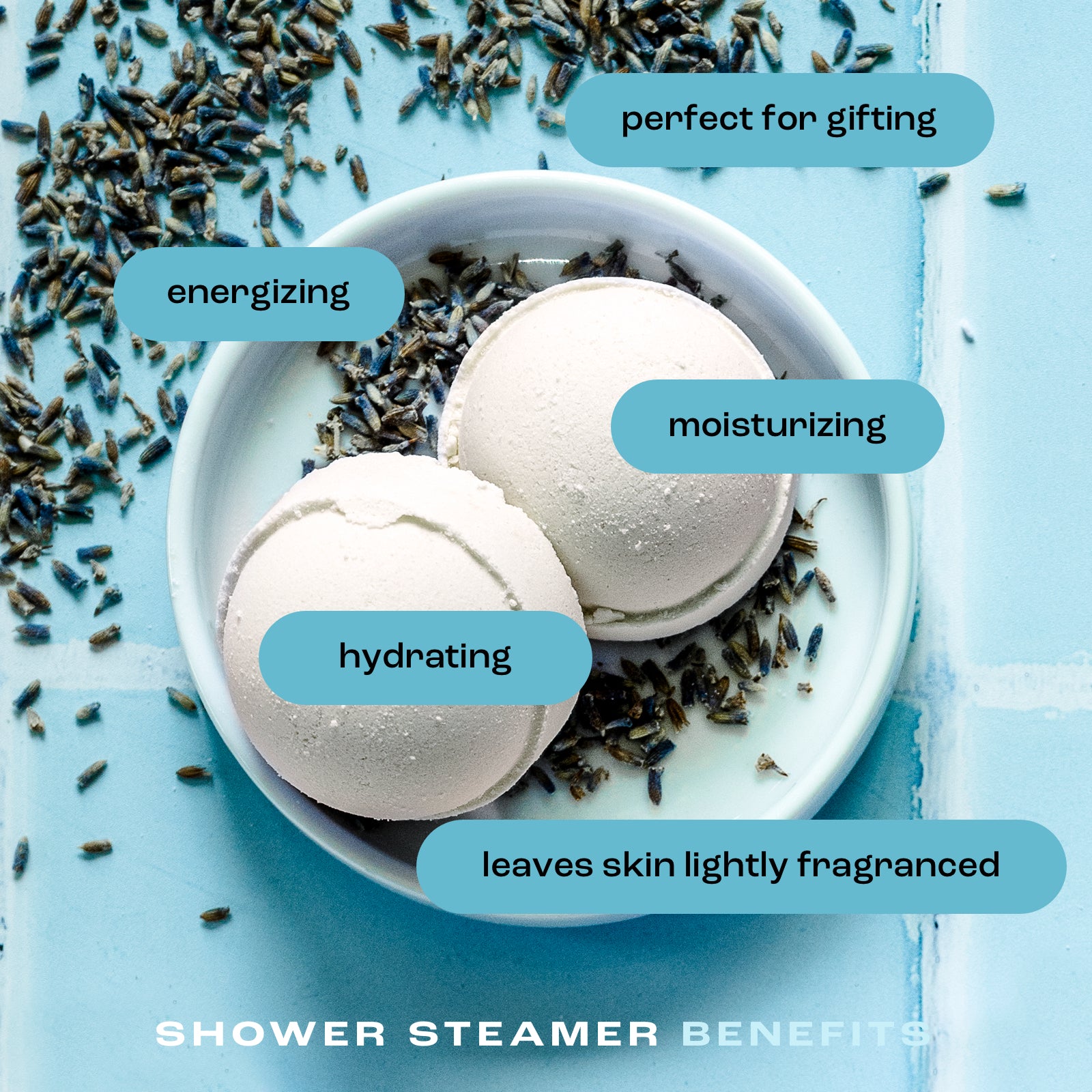 overhead view of shower steamers in a dish on a tile background with the listed benefits: perfect for gifting, energizing, moisturizing, hydrating and leaves skin lightly fragranced