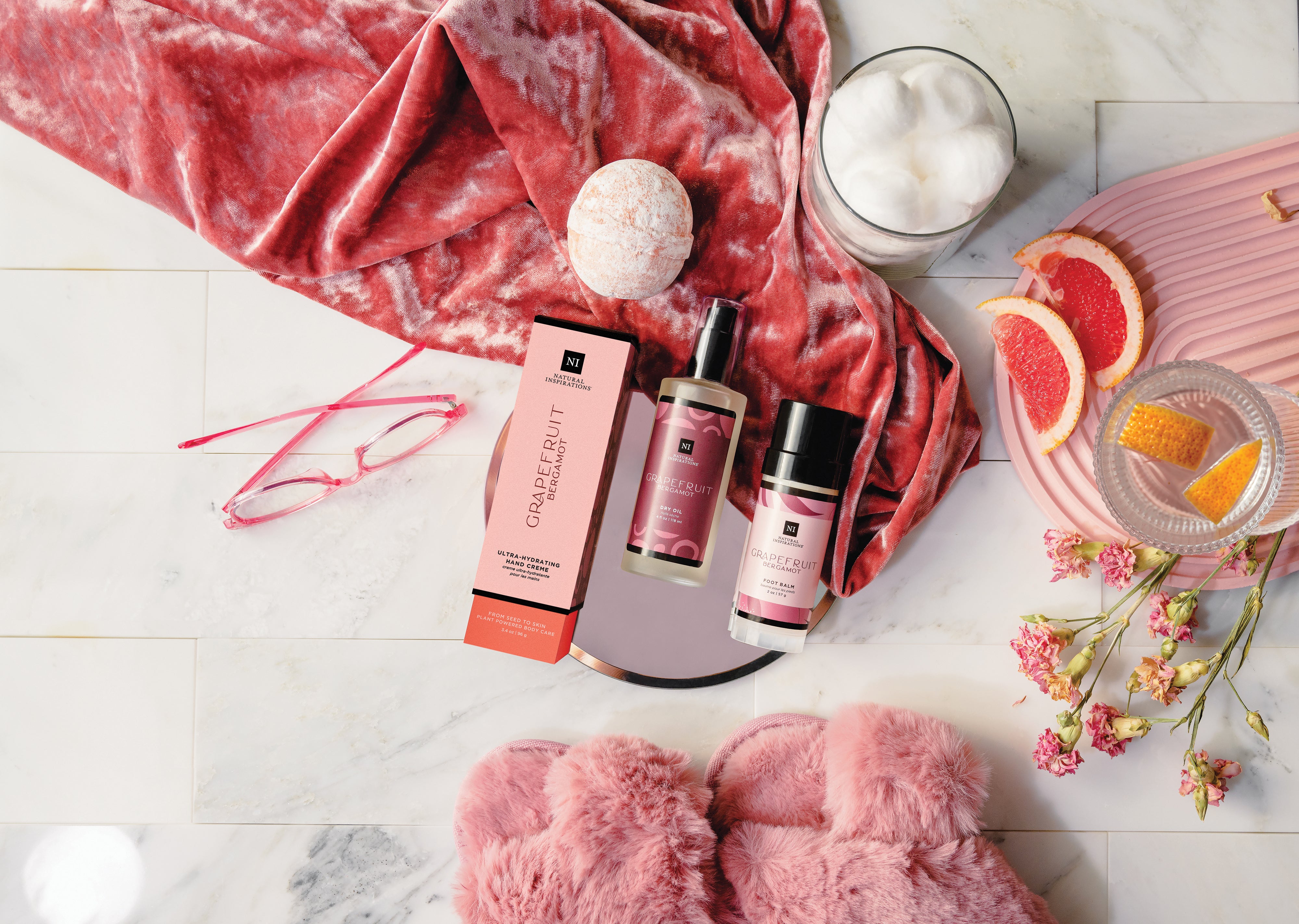 overhead view of grapefruit bergamot products in a bathroom setting